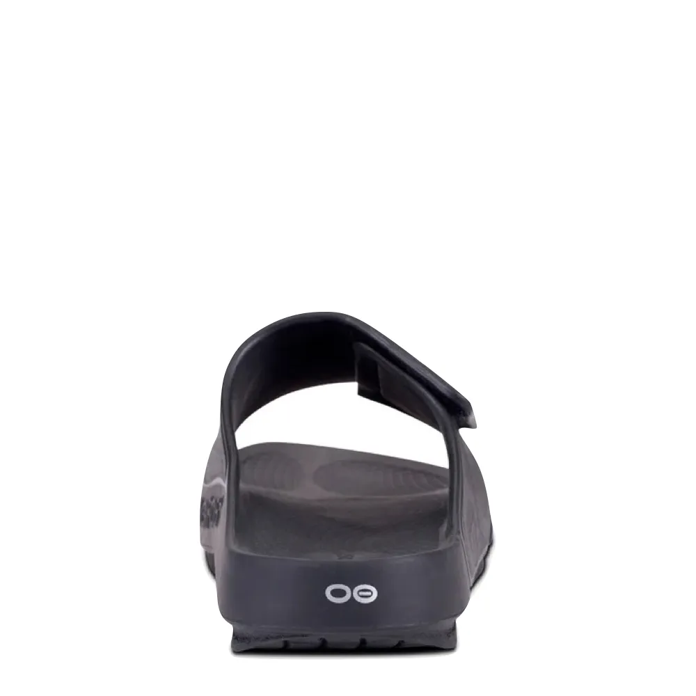 OOfos OOahh Sport Flex Adjustable Slide Sandal in Black