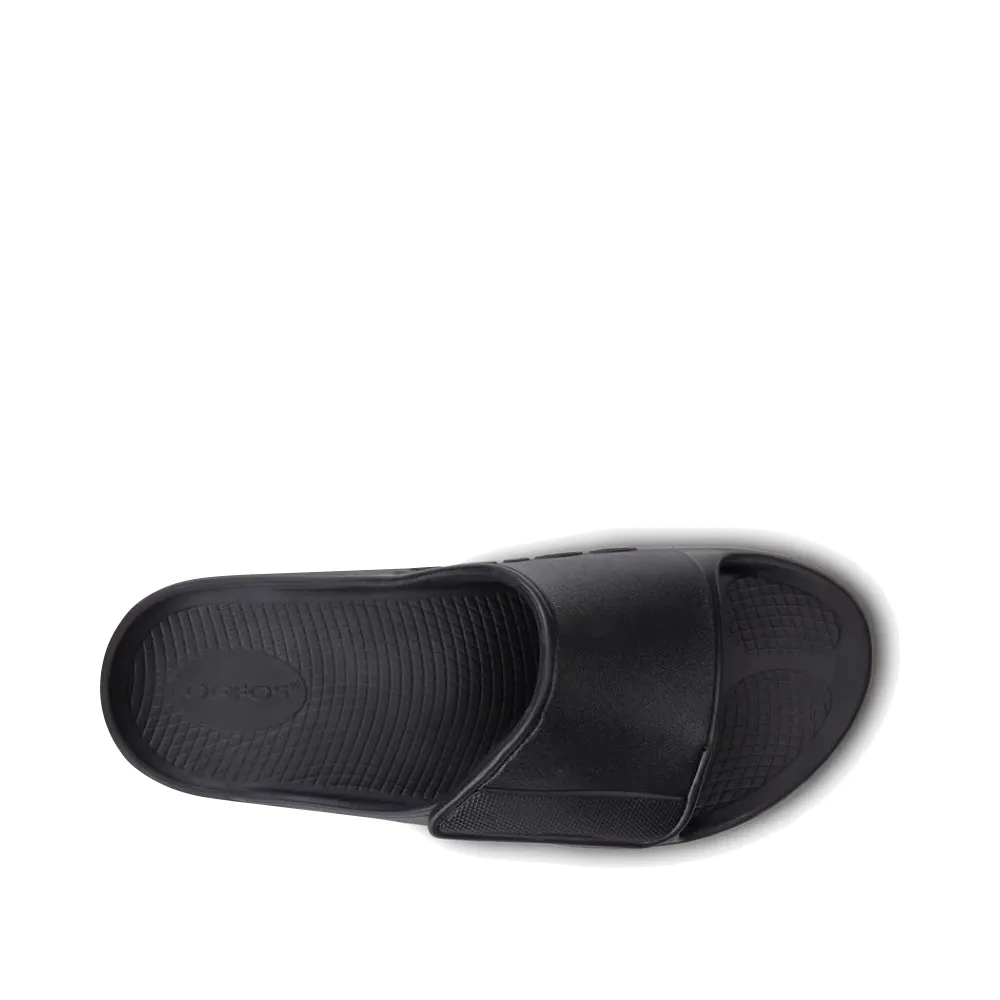 OOfos OOahh Sport Flex Adjustable Slide Sandal in Black