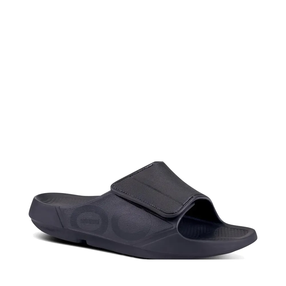 OOfos OOahh Sport Flex Adjustable Slide Sandal in Black